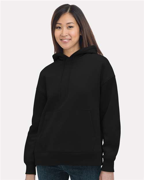 Bayside Women's USA-Made Hooded Sweatshirt in Black, front view on model