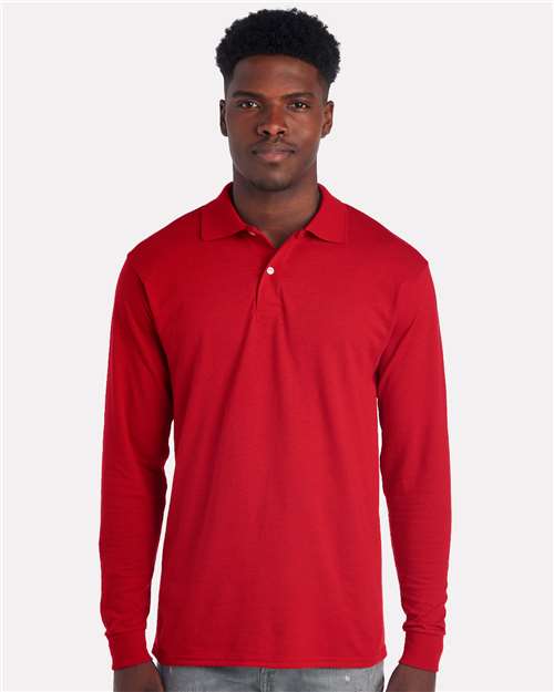 JERZEES Men's Dri-Power® Long Sleeve Polo in True Red, front view on model