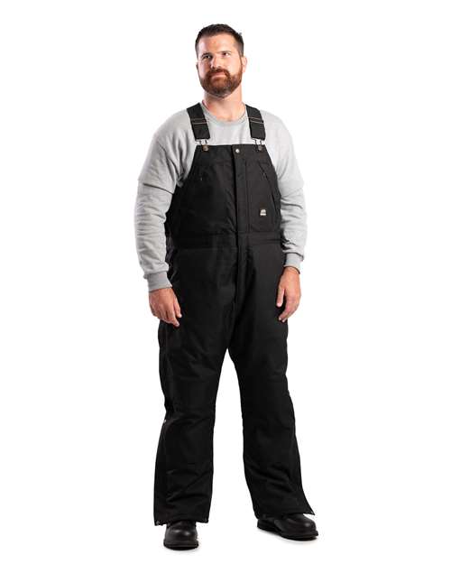 Berne Apparel Men's Icecap Insulated Bib Overall in Black, front view on model