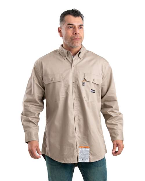 Berne Apparel Men's Flame-Resistant Button-Down Work Shirt in Khaki, front view on model