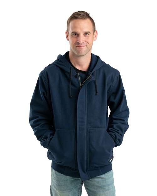 Berne Apparel Men's Flame Resistant Full-Zip Hooded Sweatshirt in Navy, front view on model