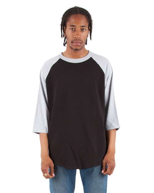 Shaka Wear Unisex Raglan Tee in Black/Heather Grey, front view on model