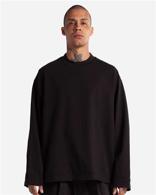 Shaka Wear Unisex Max Heavyweight Oversized Long Sleeve Tee in Black, front view on model